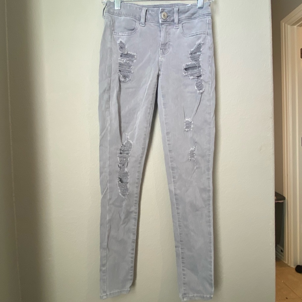 Grey American eagle skinny ripped jeans - size 2